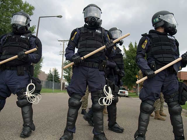 Officers in Riot Gear with Hardwood Riot Baton
